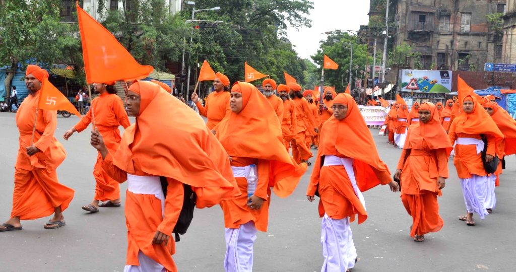 Acaryas participating in a city procession